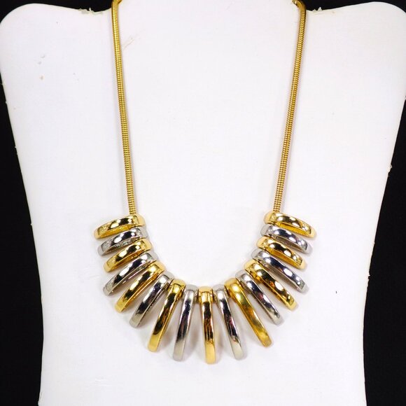 Silver and gold necklace with dome shape metal links attached to a snake chain - Picture 7 of 8